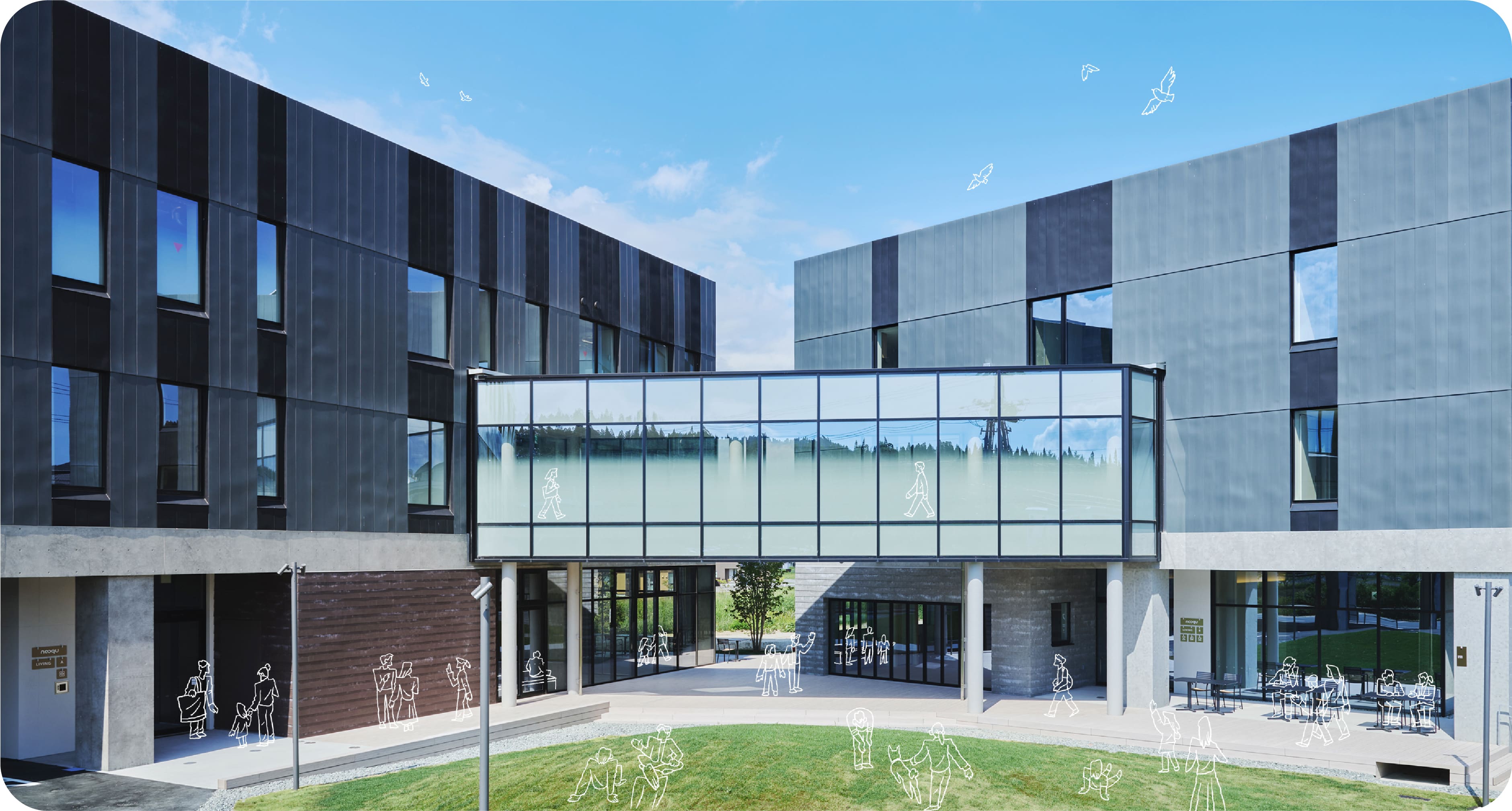 モダンな複合施設nooqu外観、青い建物と緑の芝生